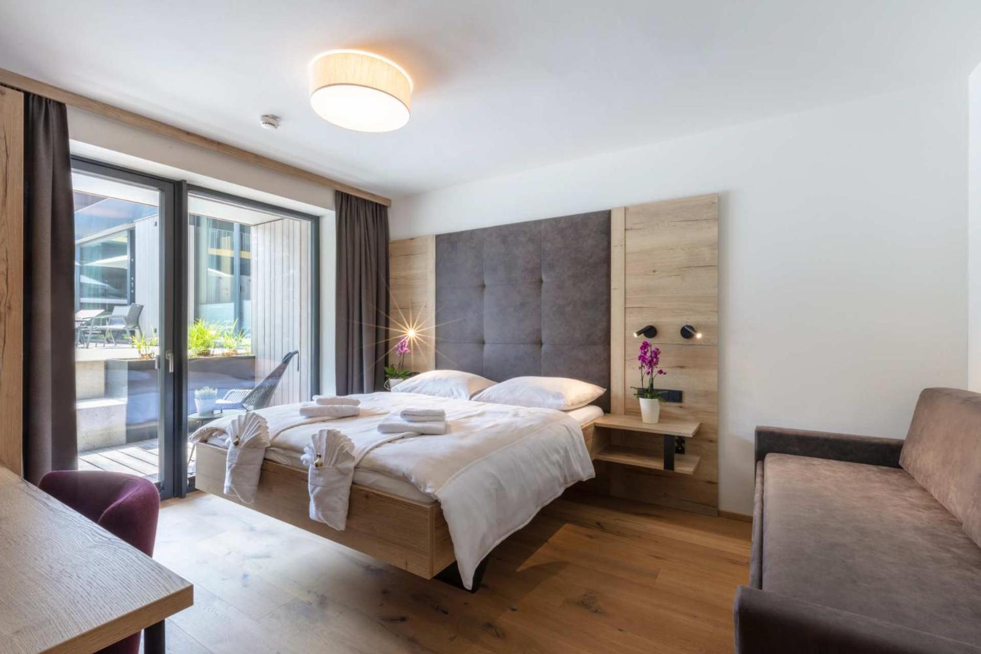 Emma Deluxe Aparthotel Ganzjaehrig Beheizter Aussenpool Piesendorf Bilik gambar